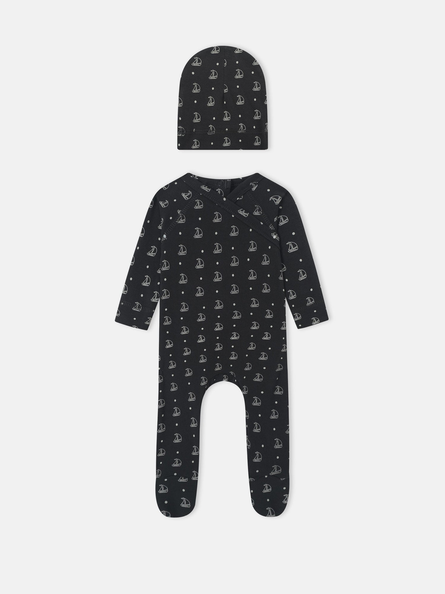 Harbor Dot layette set by Adee for baby boys; navy fabric with white sailboats, includes hat and romper.