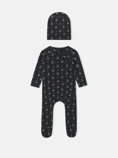 Harbor Dot layette set by Adee for baby boys; navy fabric with white sailboats, includes hat and romper.