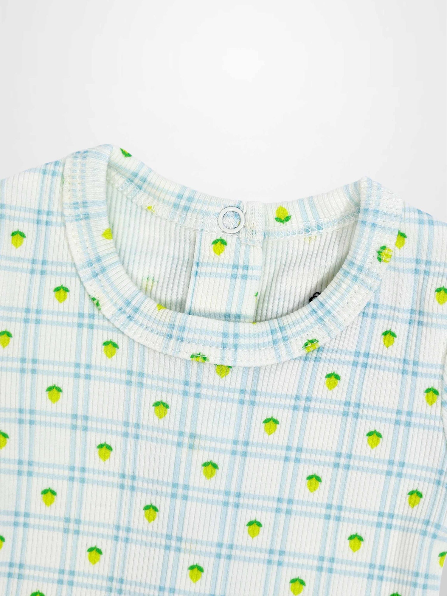 Lemon Window Stretchy baby footie with crisp white base, light blue grid plaid and tiny lemons, breathable ribbed fabric.