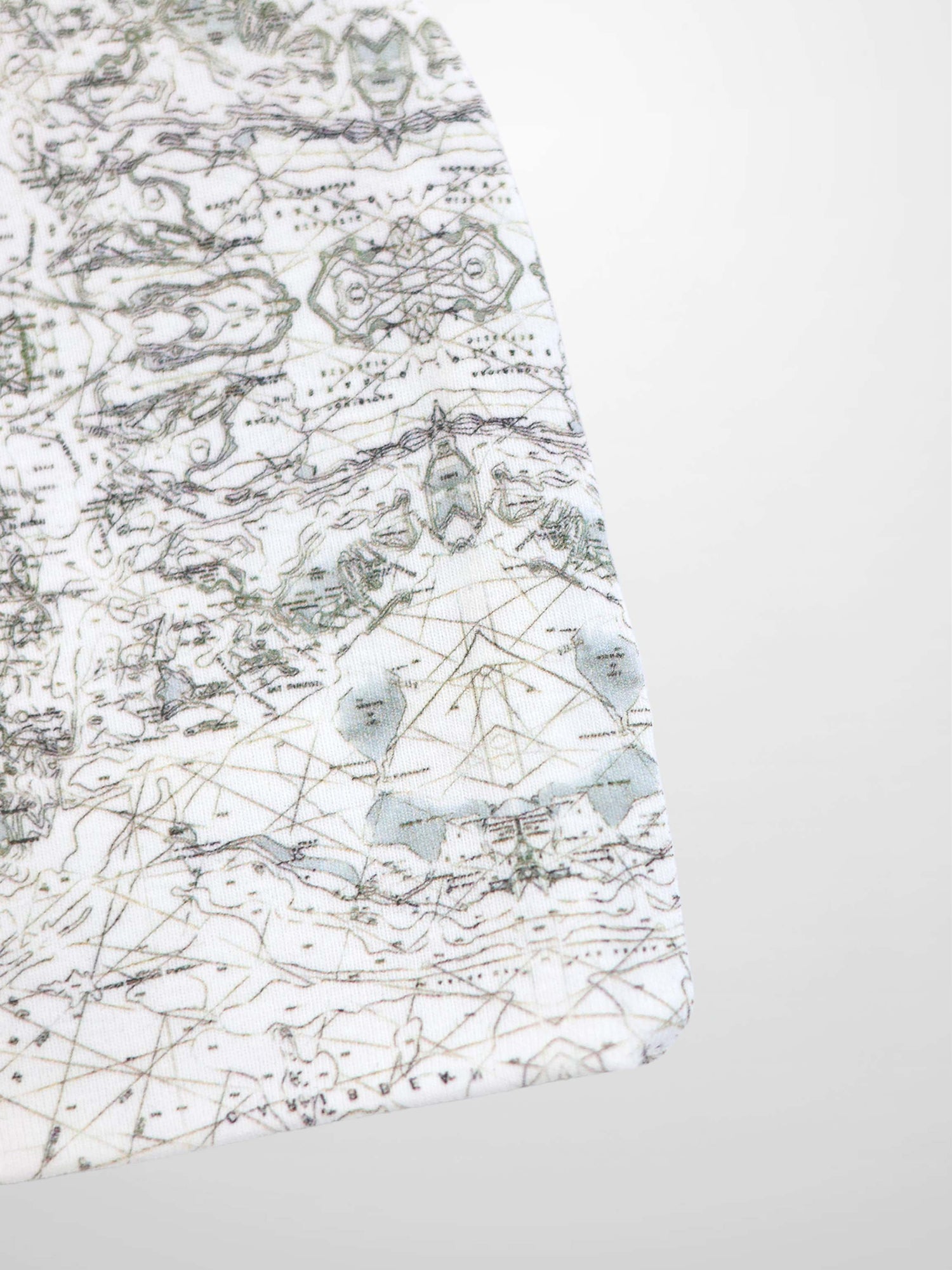 Map Beanie for baby boys, off-white with a fine map print, compass markers, and decorative stitching.