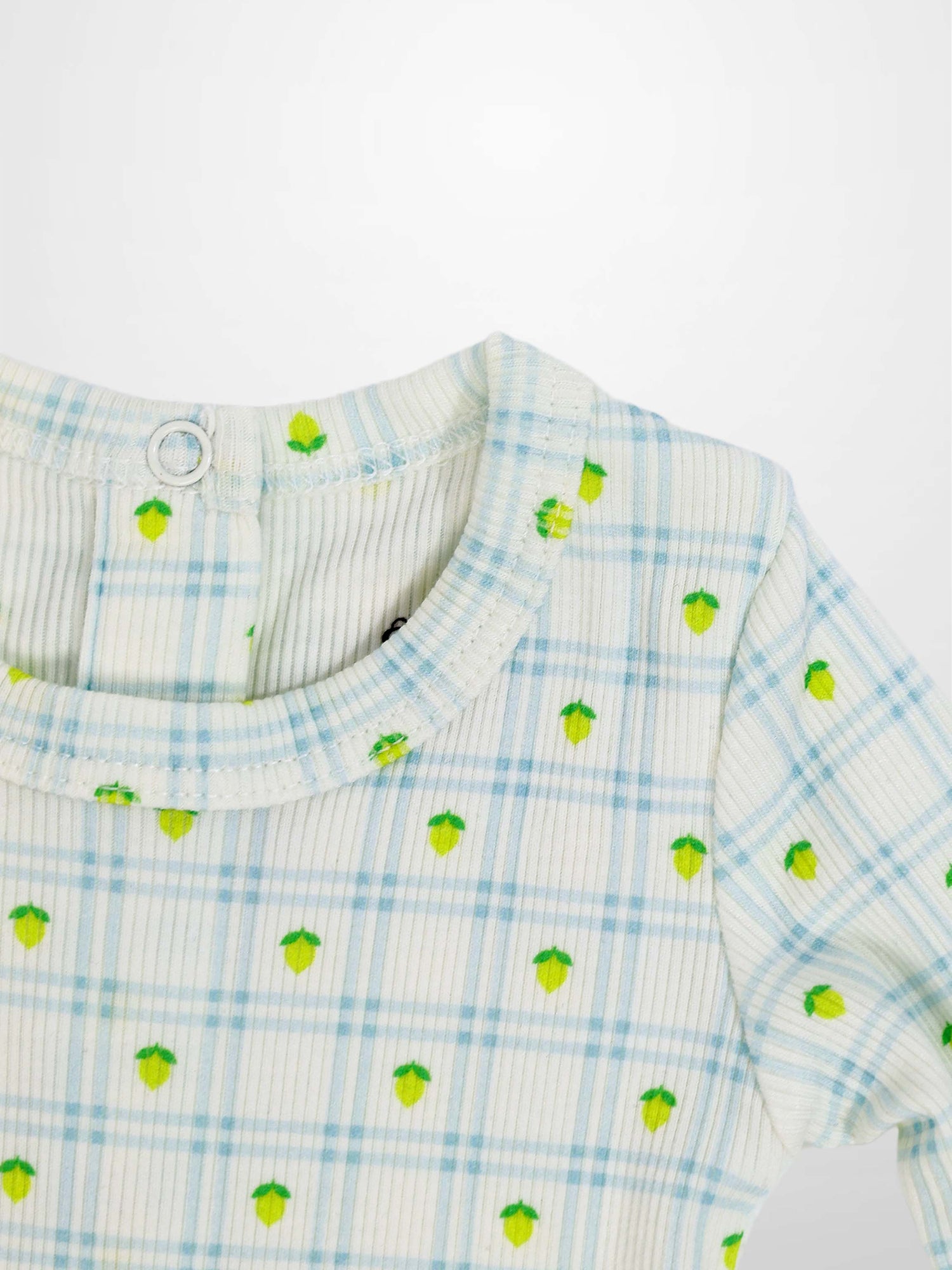 Lemon Window Stretchy: white base baby boy footie with light blue grid-style plaid and yellow lemons, ribbed fabric.