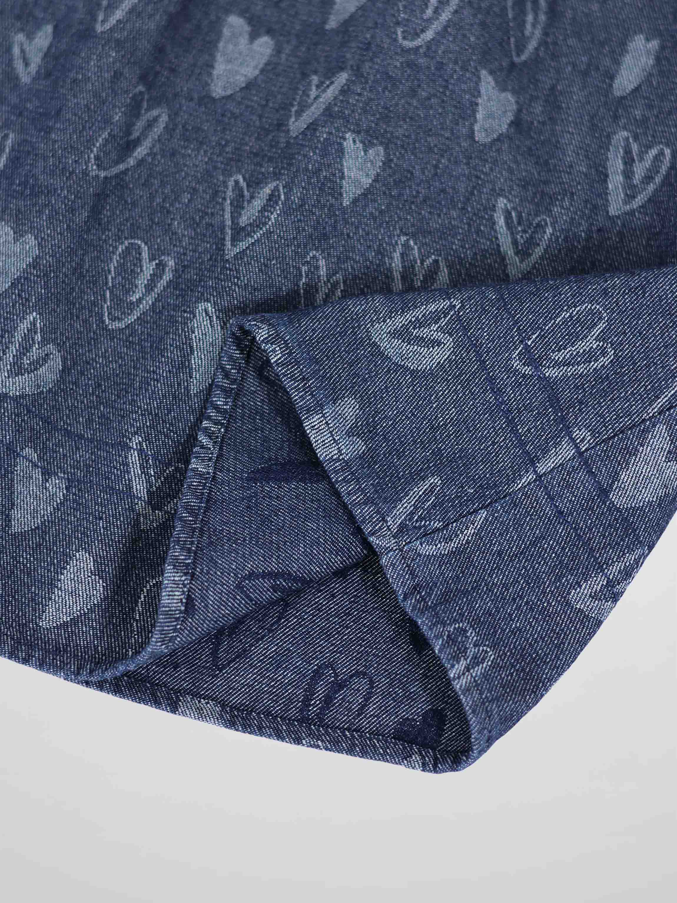 Denim Heart Jumper fabric featuring repeated light heart motifs.
