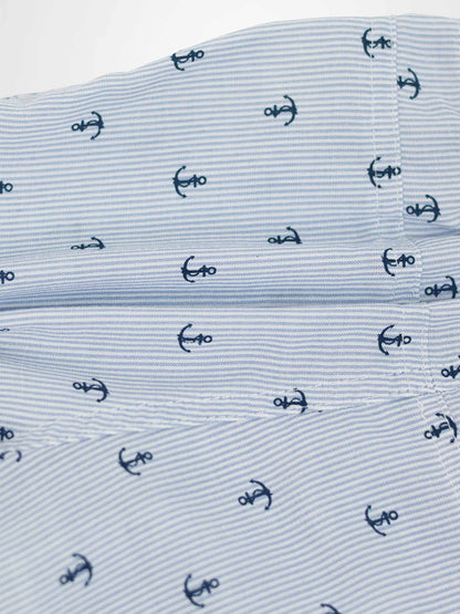 Anchor Shorts fabric close-up with narrow blue stripes and scattered navy anchor motifs.