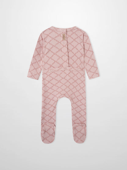 Adee Pink Leaf layette sleeper for girls with back snaps and footed design