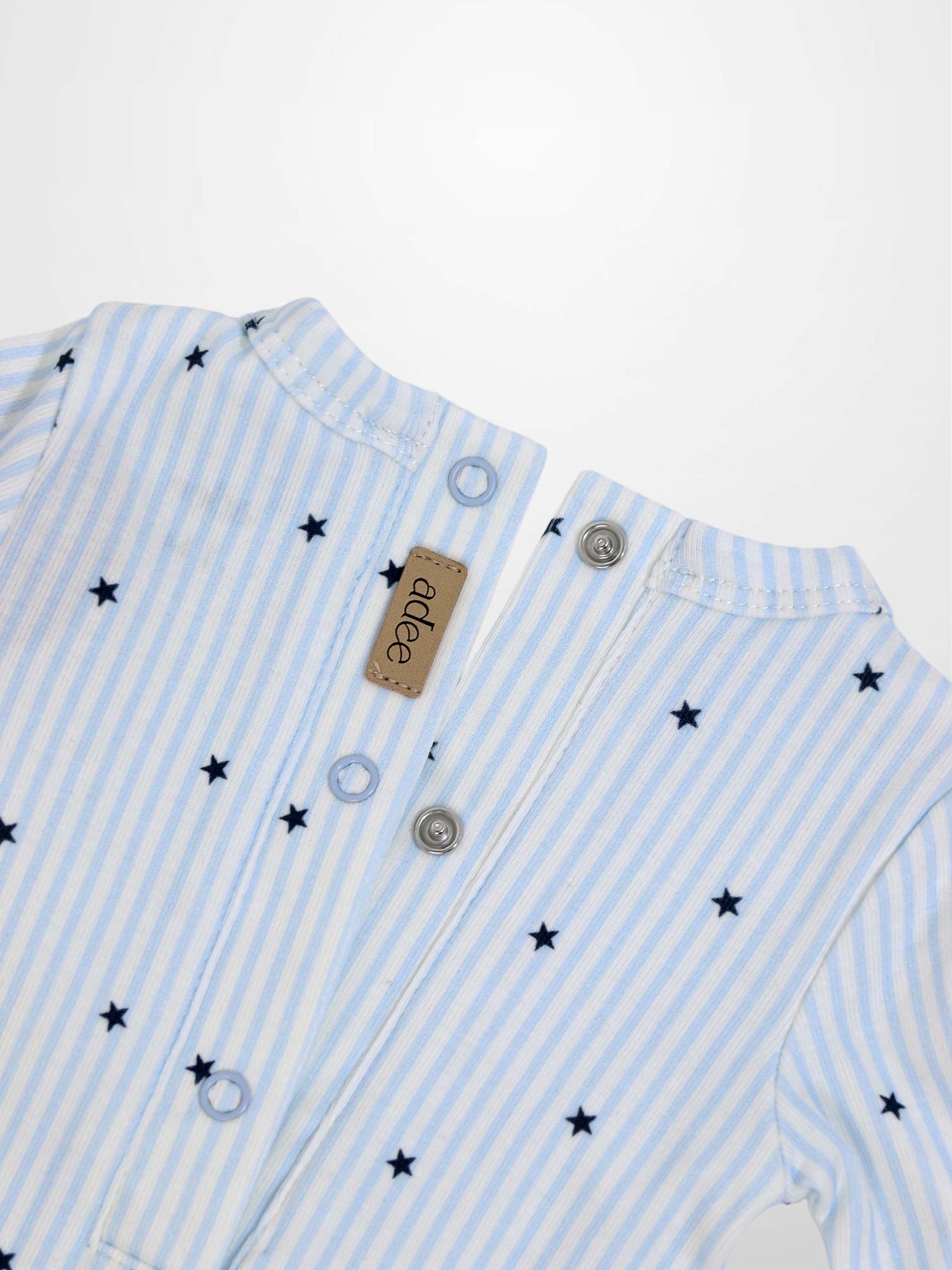 Blue Star Stretchy baby footie jumpsuit in light blue stripes with dark blue stars and snap buttons.