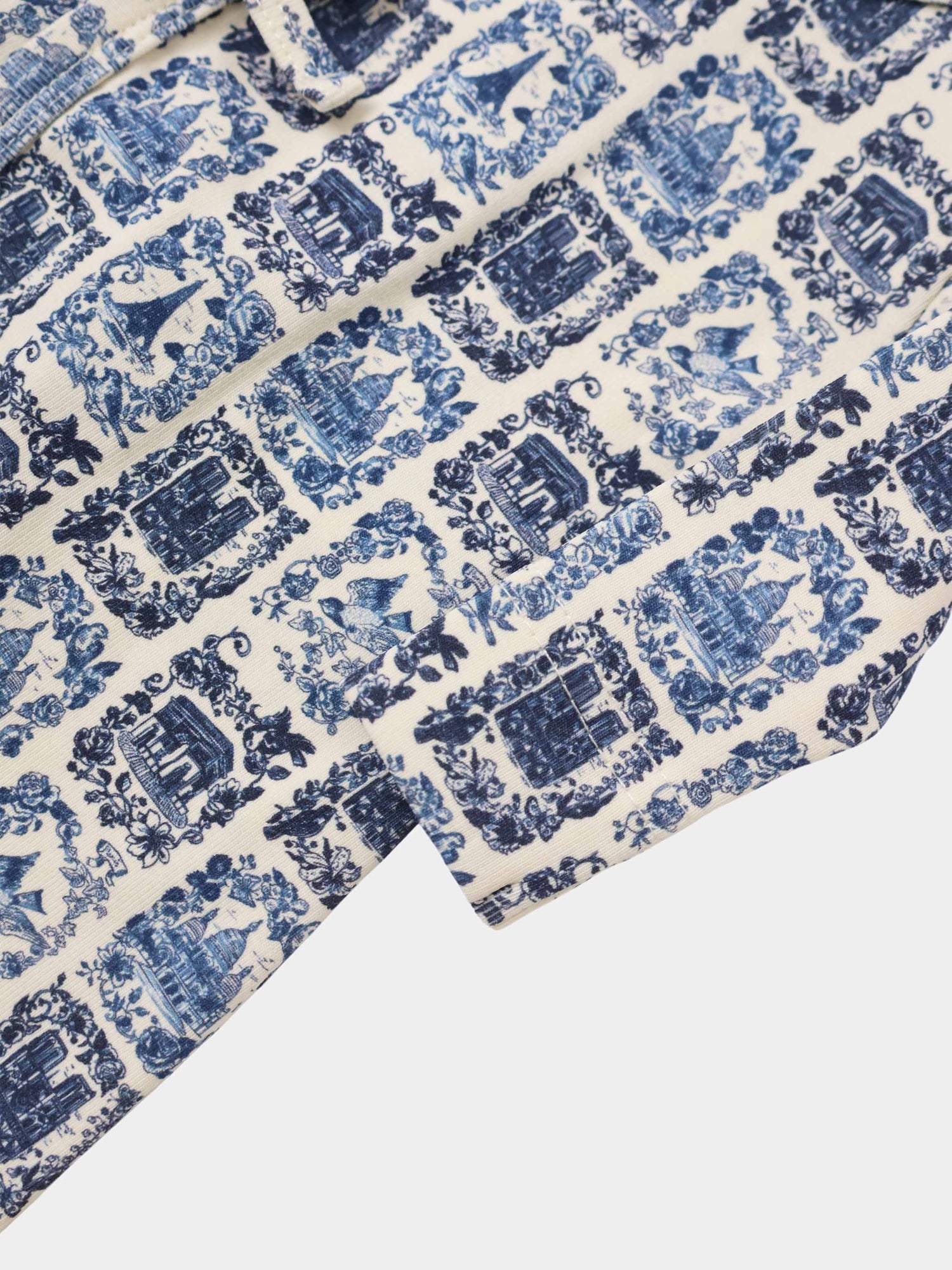 Blue Landmark layette set for boys by Adee; toile-inspired pattern with landmarks and florals.