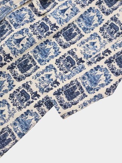 Blue Landmark layette set for boys by Adee; toile-inspired pattern with landmarks and florals.