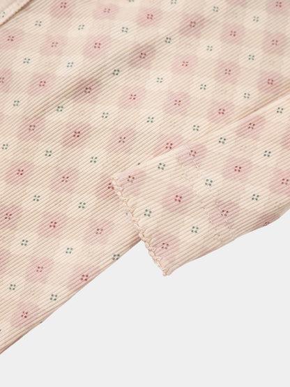 Little Button Pink layette set by Adee; pink striped fabric with teal and pink dot clusters.