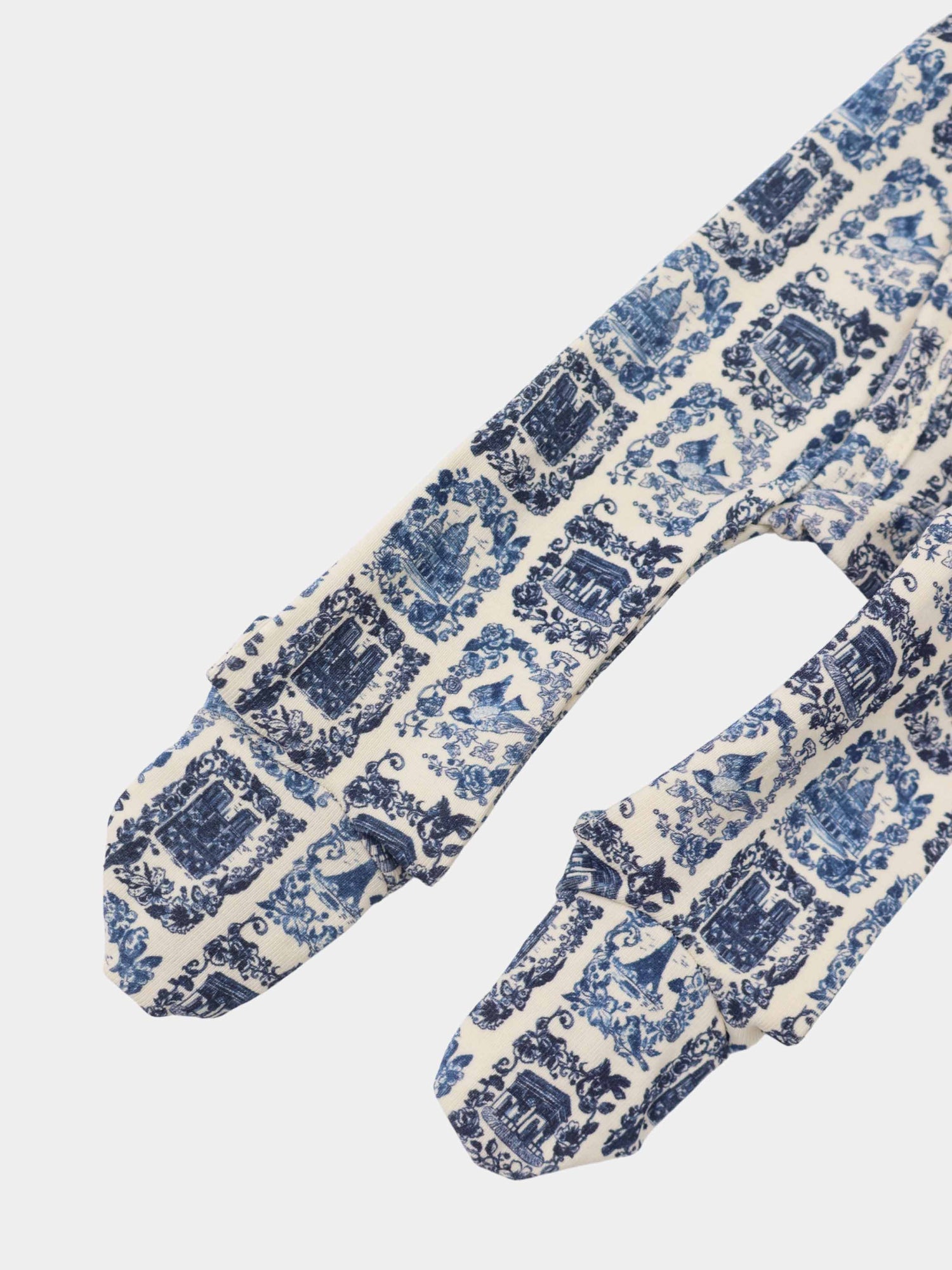 Blue Landmark layette set for boys by Adee with blue toile print on cream fabric.
