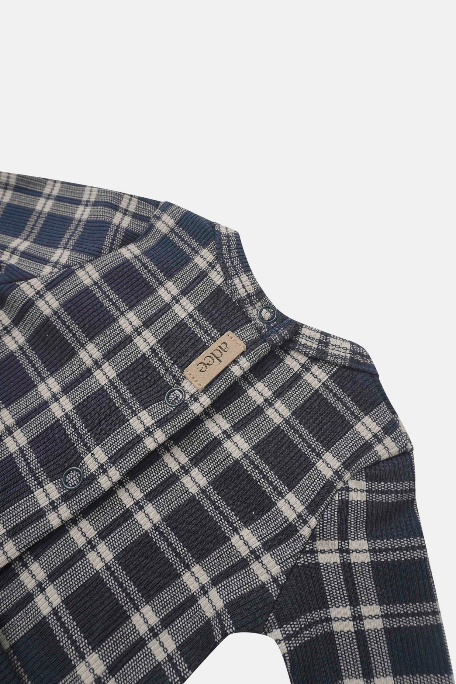 Navy plaid Stretchy for boys by Adee; knit fabric with snap-button front placket.