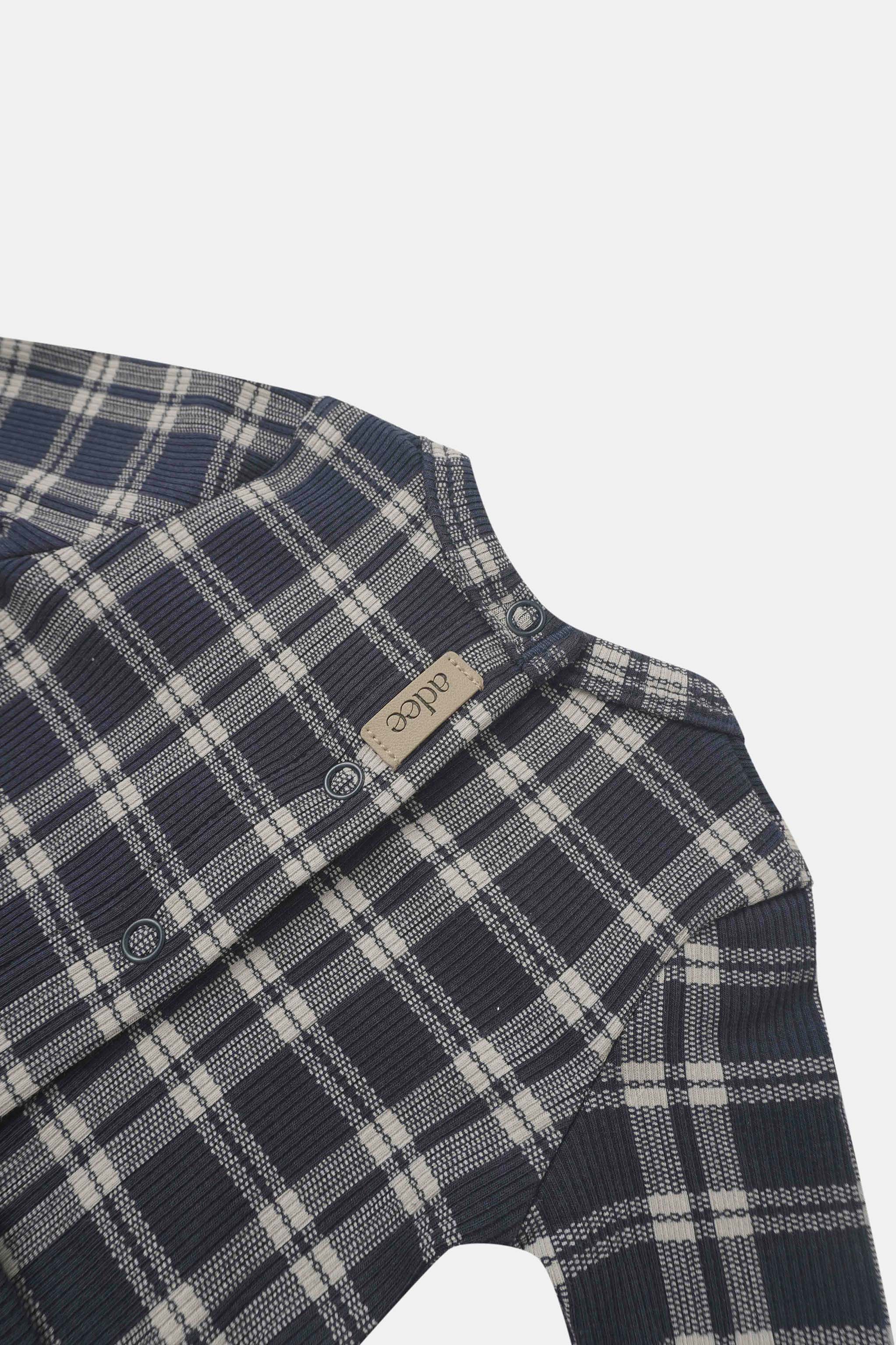 Navy plaid Stretchy for boys by Adee; knit fabric with snap-button front placket.