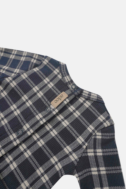 Navy plaid Stretchy for boys by Adee; knit fabric with snap-button front placket.