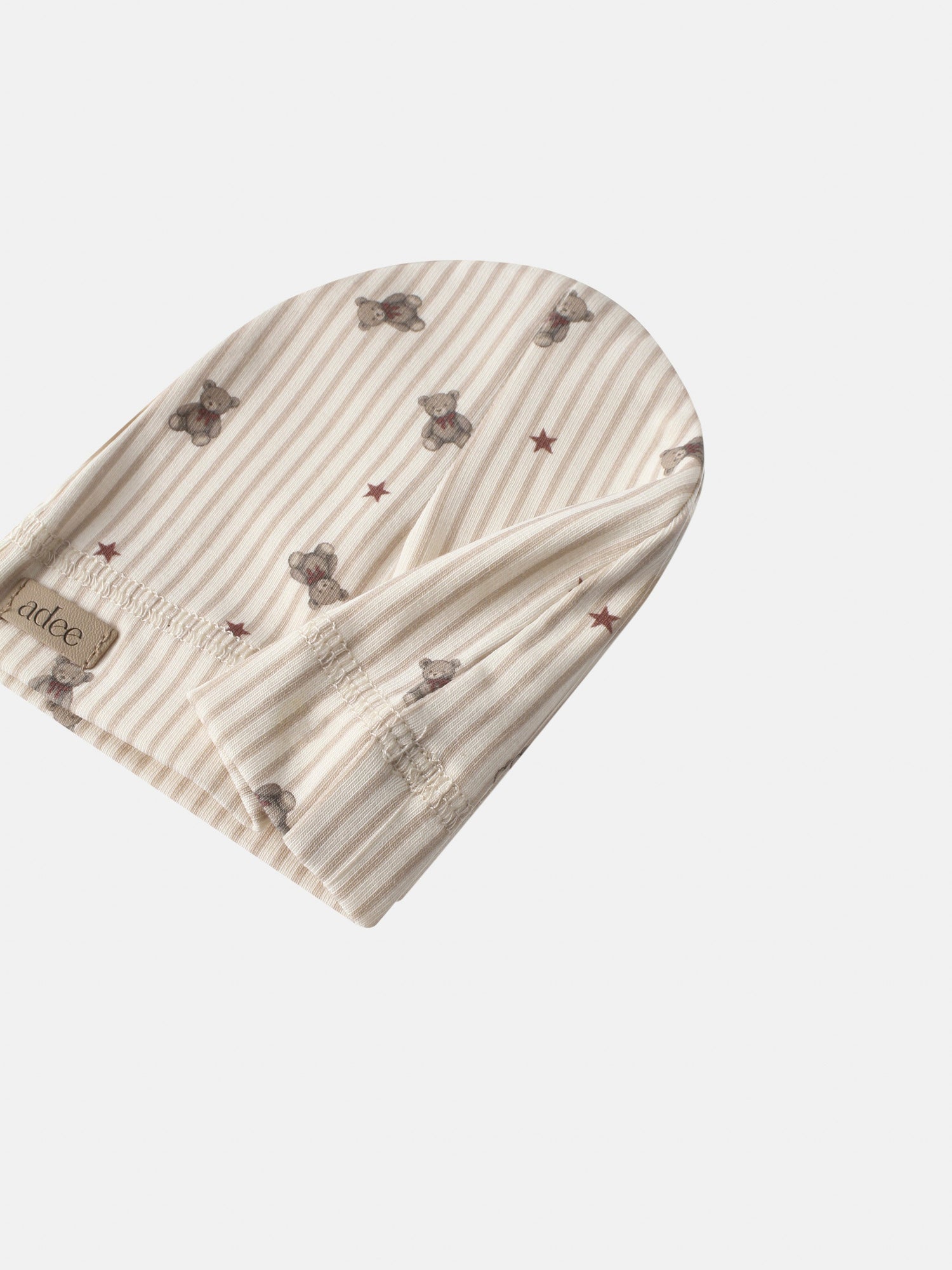 Striped bear hat for girls by Adee; beige stripes with teddy bear print and red stars
