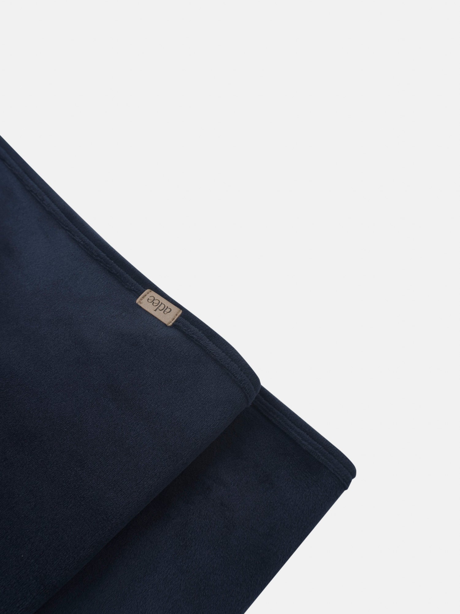 Embroidered Bear Navy layette set by Adee, navy fabric with beige brand tag.