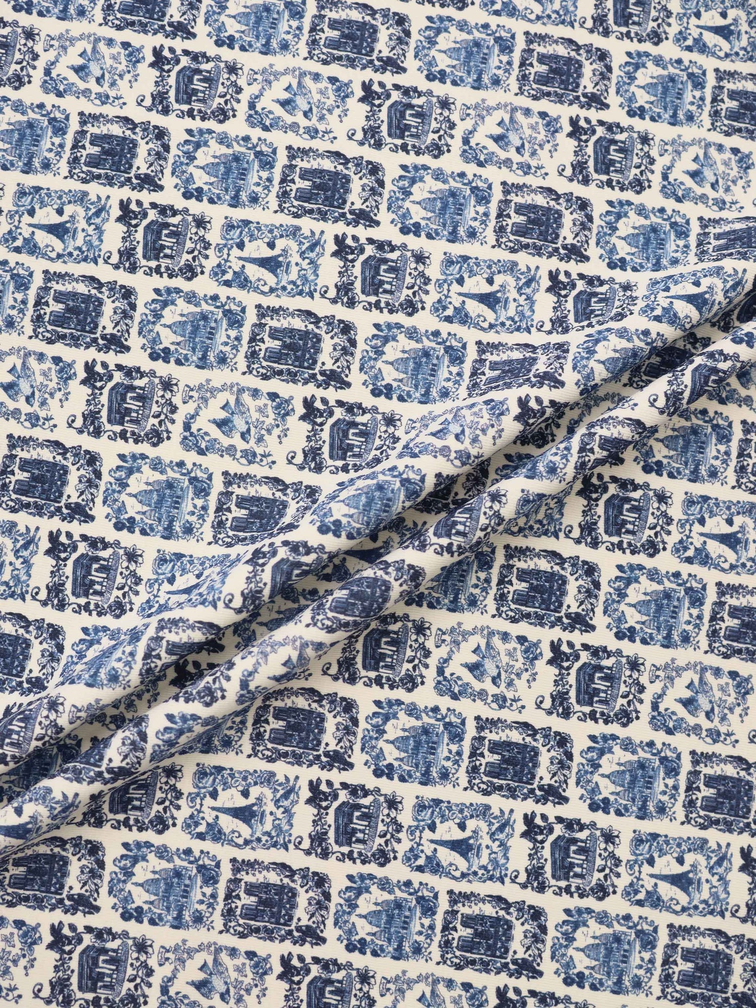 Blue Landmark layette fabric print by Adee; navy framed landmarks with floral borders on white