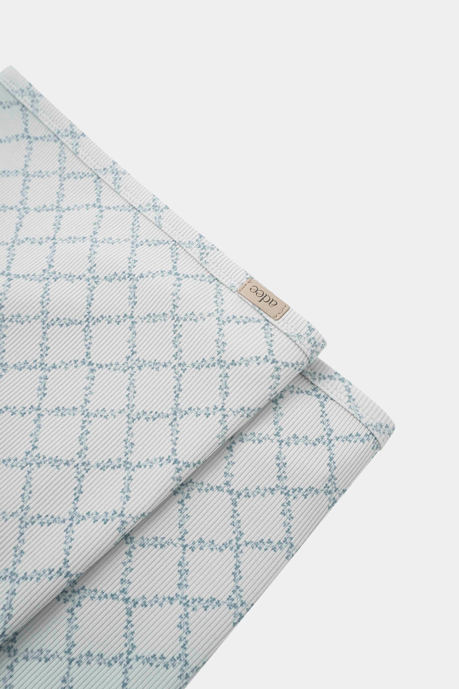 Blue Leaf Layette Set for boys by Adee, light-blue plaid fabric.