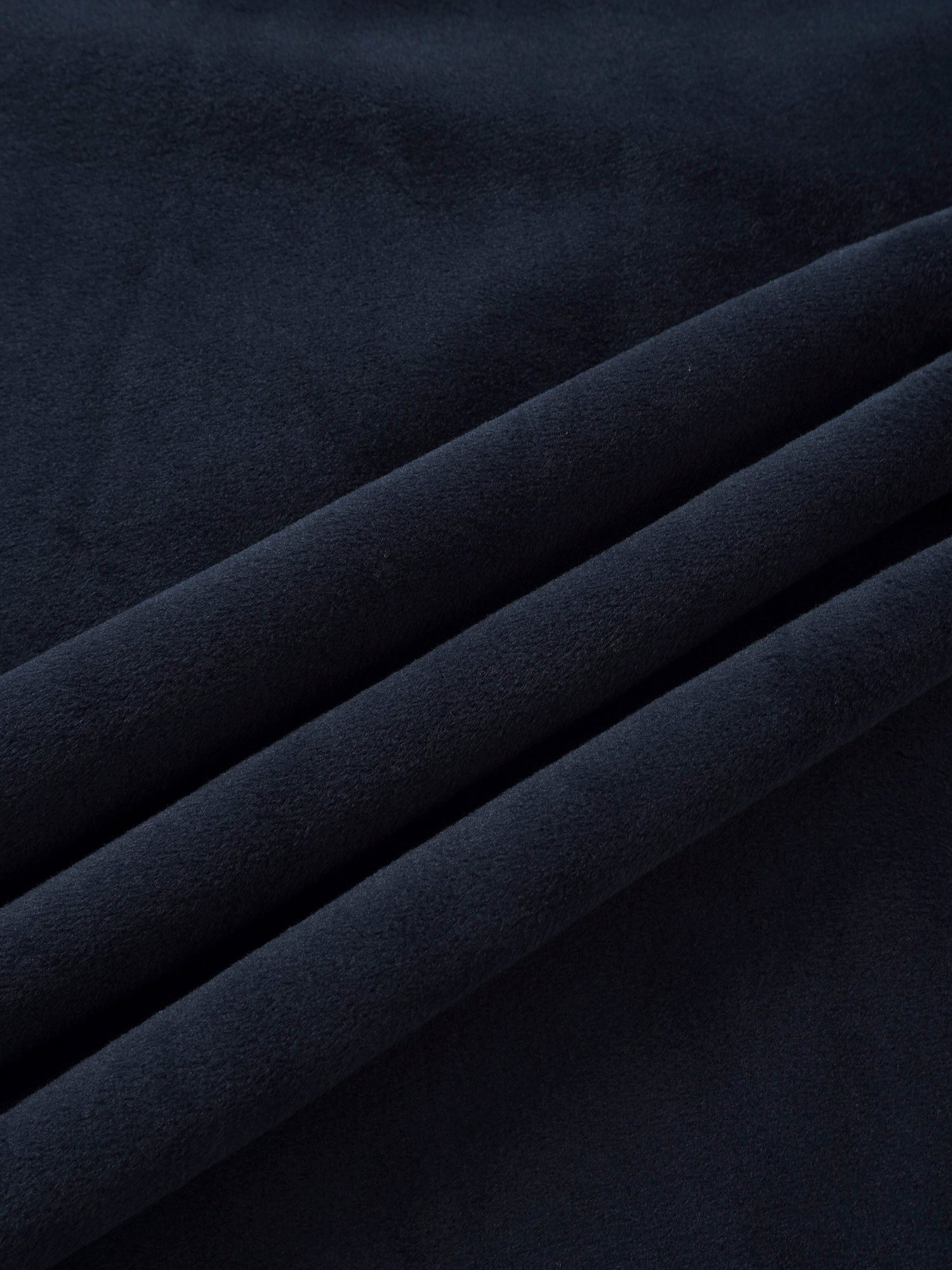 Embroidered Bear Navy layette set; Adee brand, navy blue plush fabric close-up