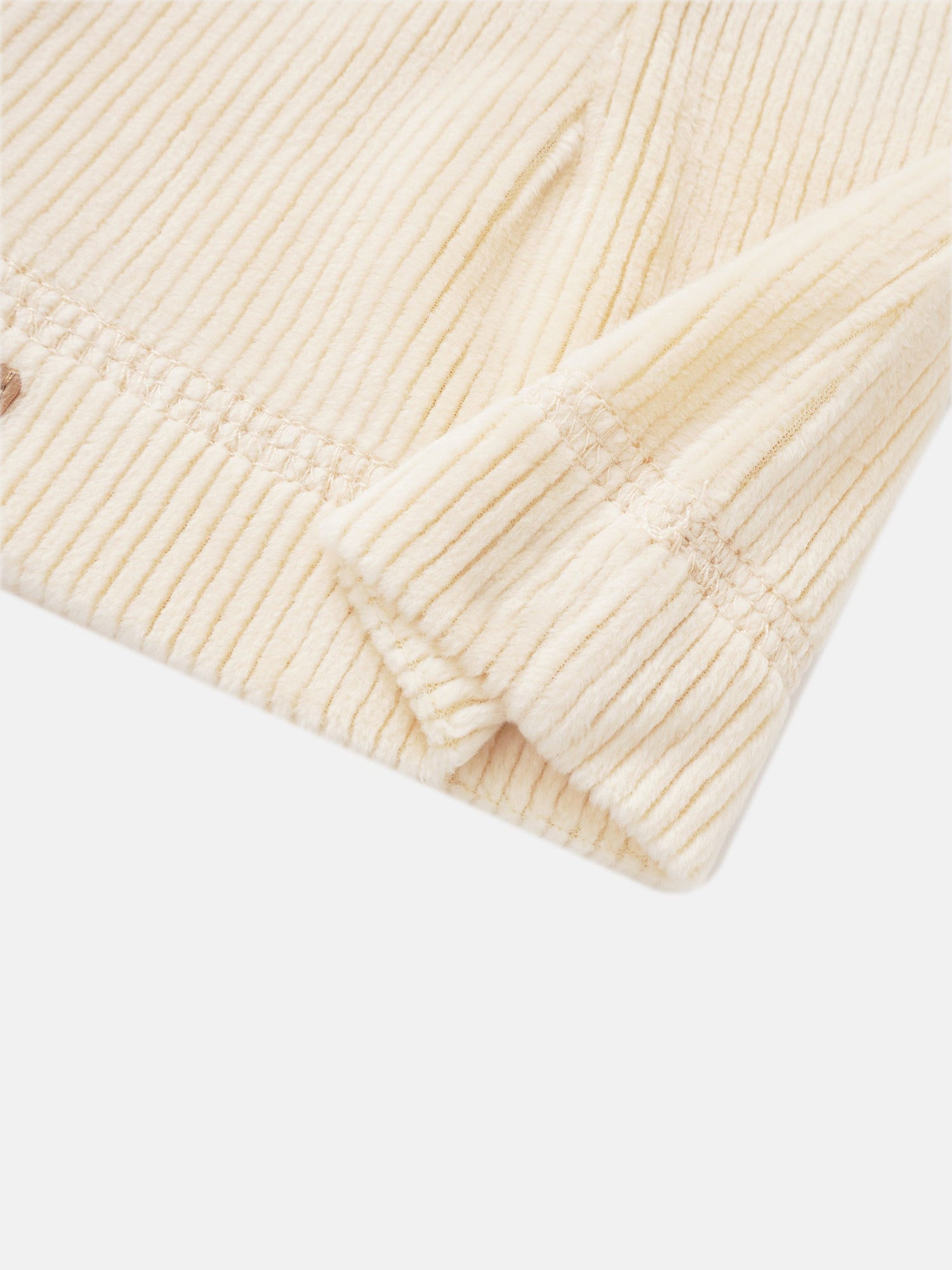 Embroidered Anchor layette set, beige corduroy fabric with ribbed texture and visible stitching