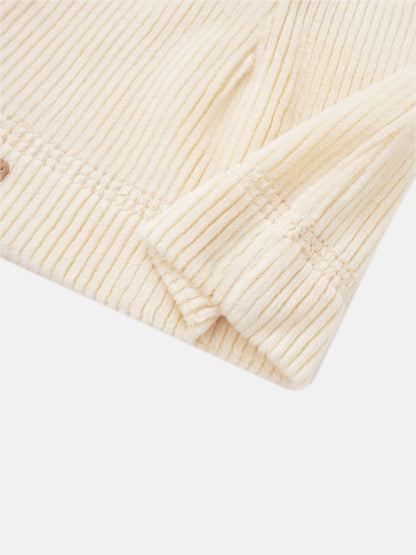 Embroidered Anchor layette set, beige corduroy fabric with ribbed texture and visible stitching