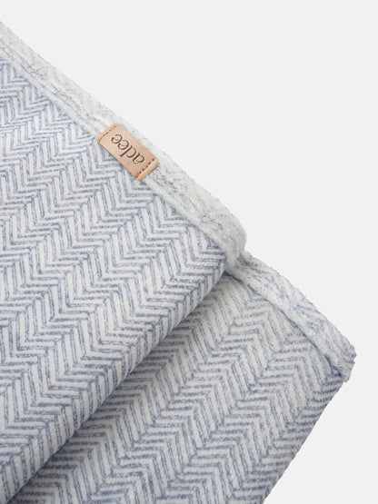Heritage Herringbone Blue layette set for boys by Adee; soft chevron fabric with tan leather brand patch