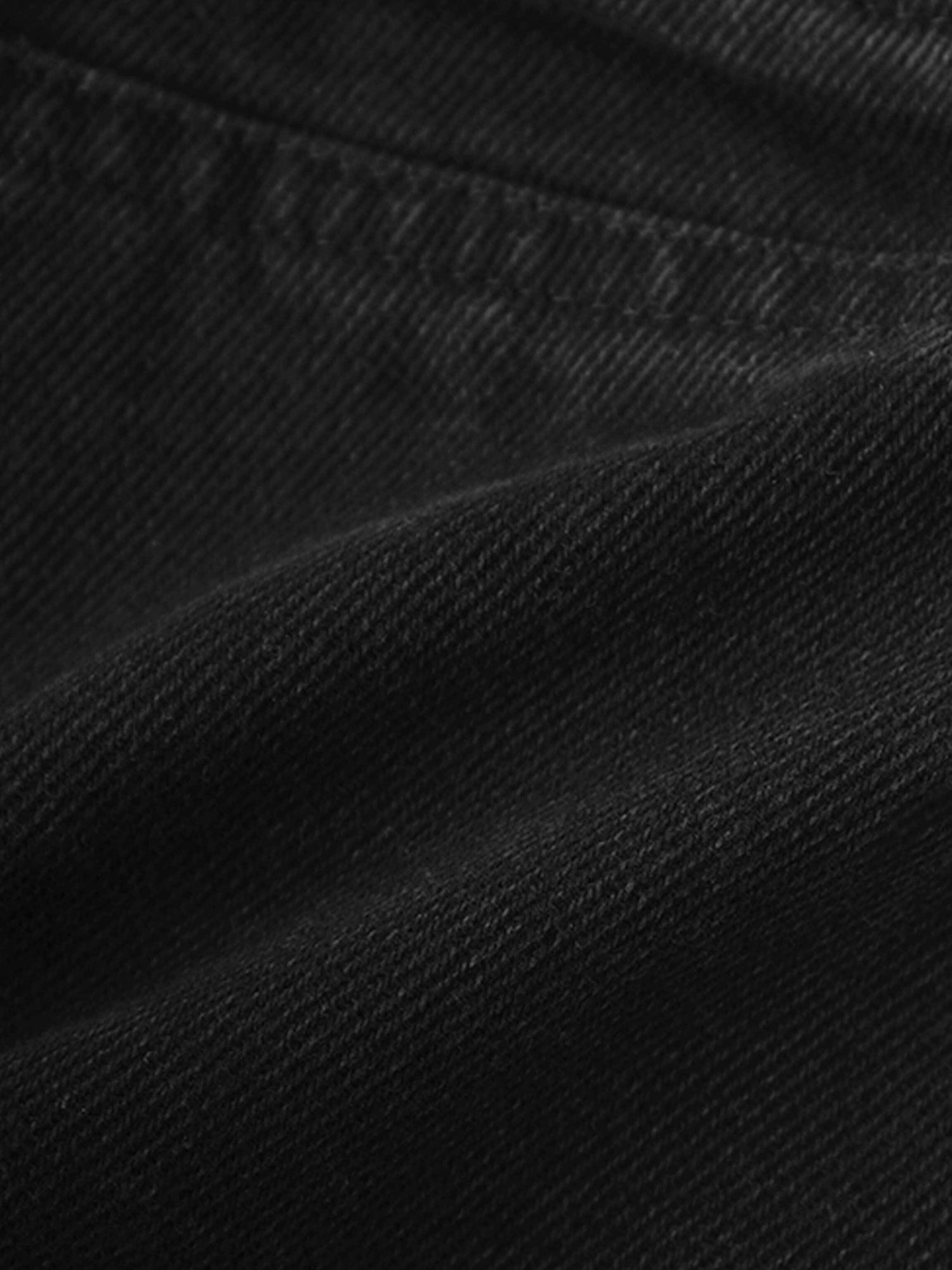 black denim fabric texture close-up