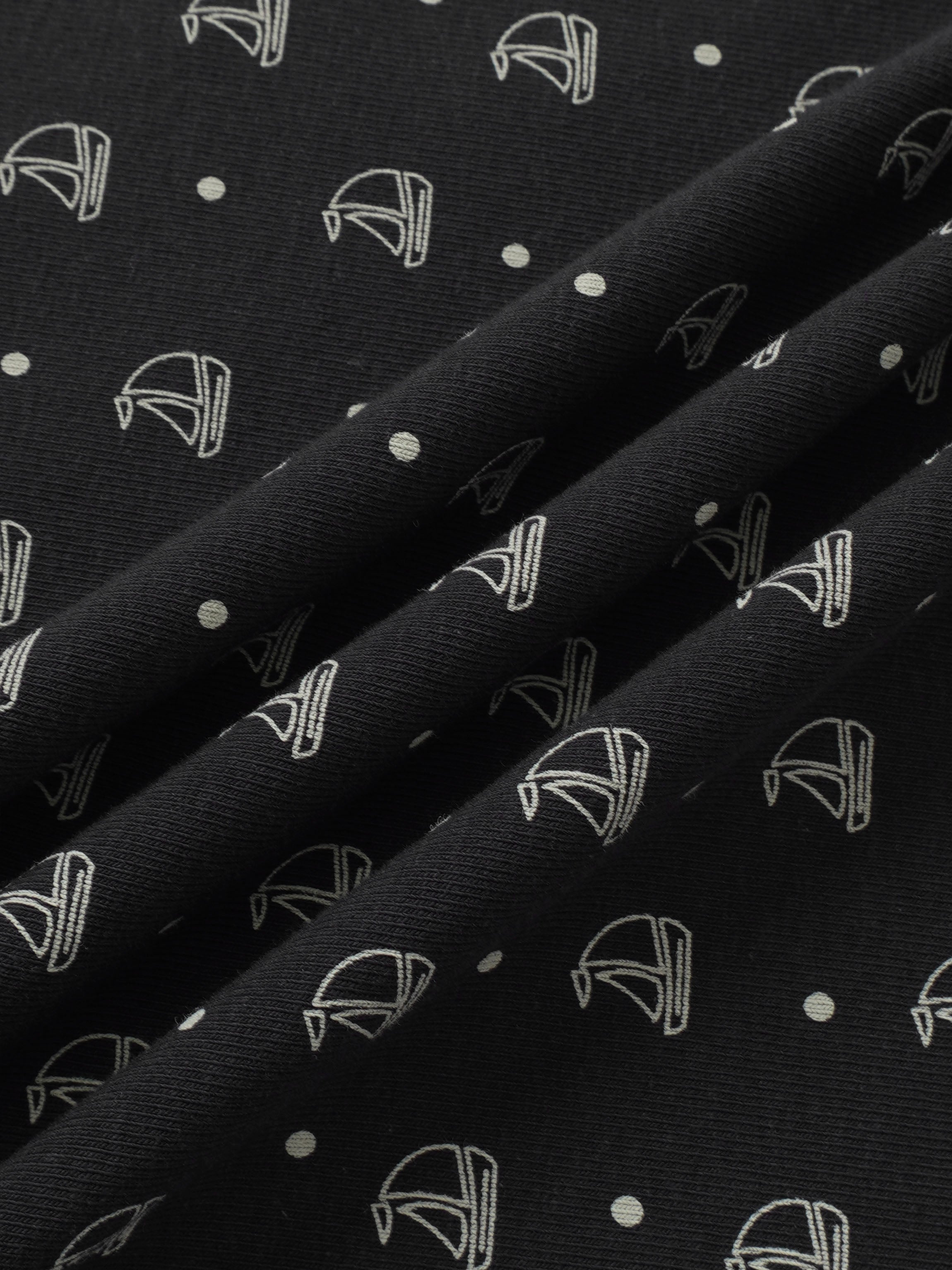 Harbor Dot layette set by Adee; navy fabric with white nautical boat icons and dots.