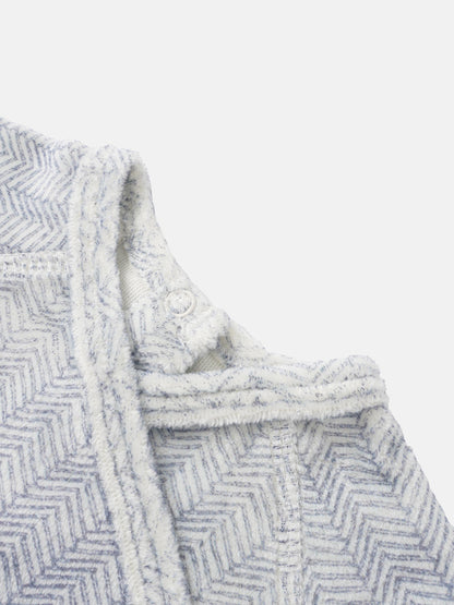 Heritage Herringbone Stretchy blue boys jacket with plush textured fabric and chevron pattern