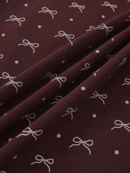 Adee Burgundy Bow T-Shirt for girls; burgundy fabric with white bow motifs.