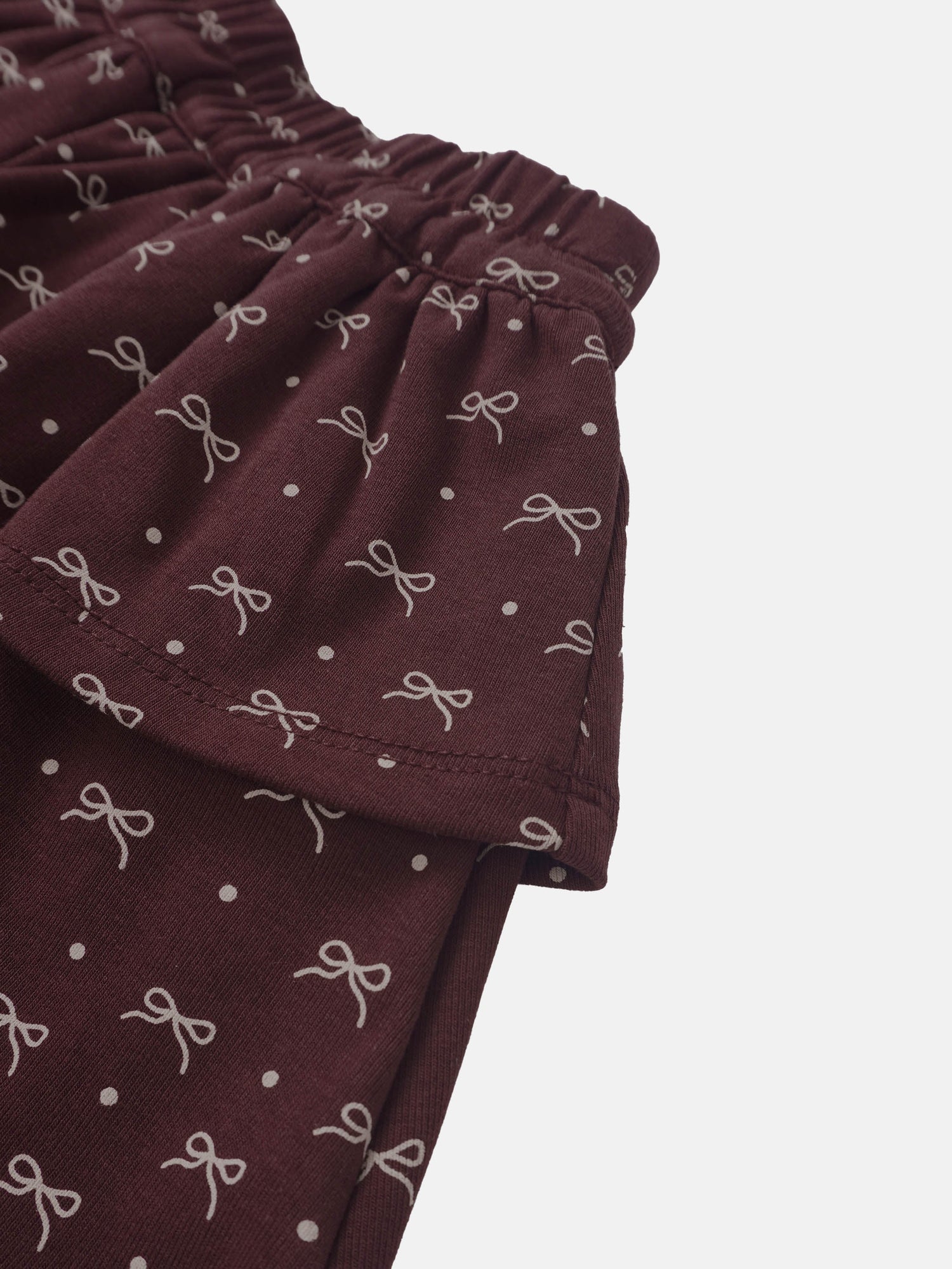 Adee Burgundy Bow Layered Skirt for Girls, burgundy fabric with white bow prints and dots.
