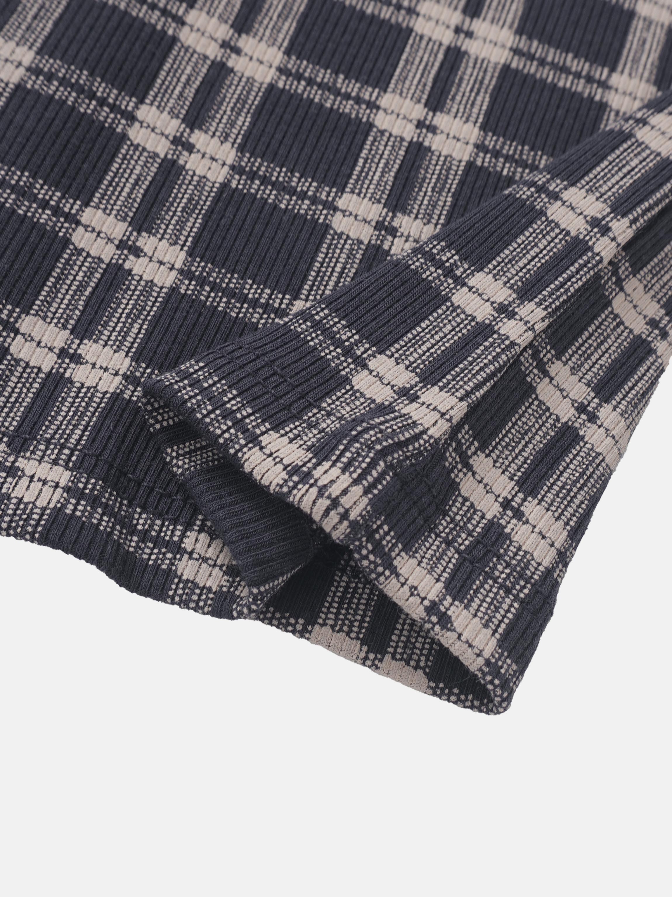Boys plaid pajamas by Adee in blue with beige accents, folded