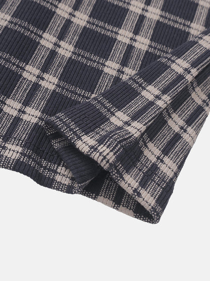 Boys plaid pajamas by Adee in blue with beige accents, folded