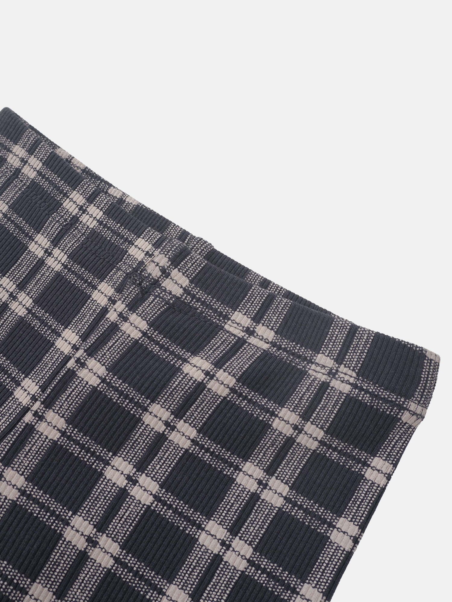Plaid pajama pants for boys in blue by Adee, closeup of textured plaid fabric