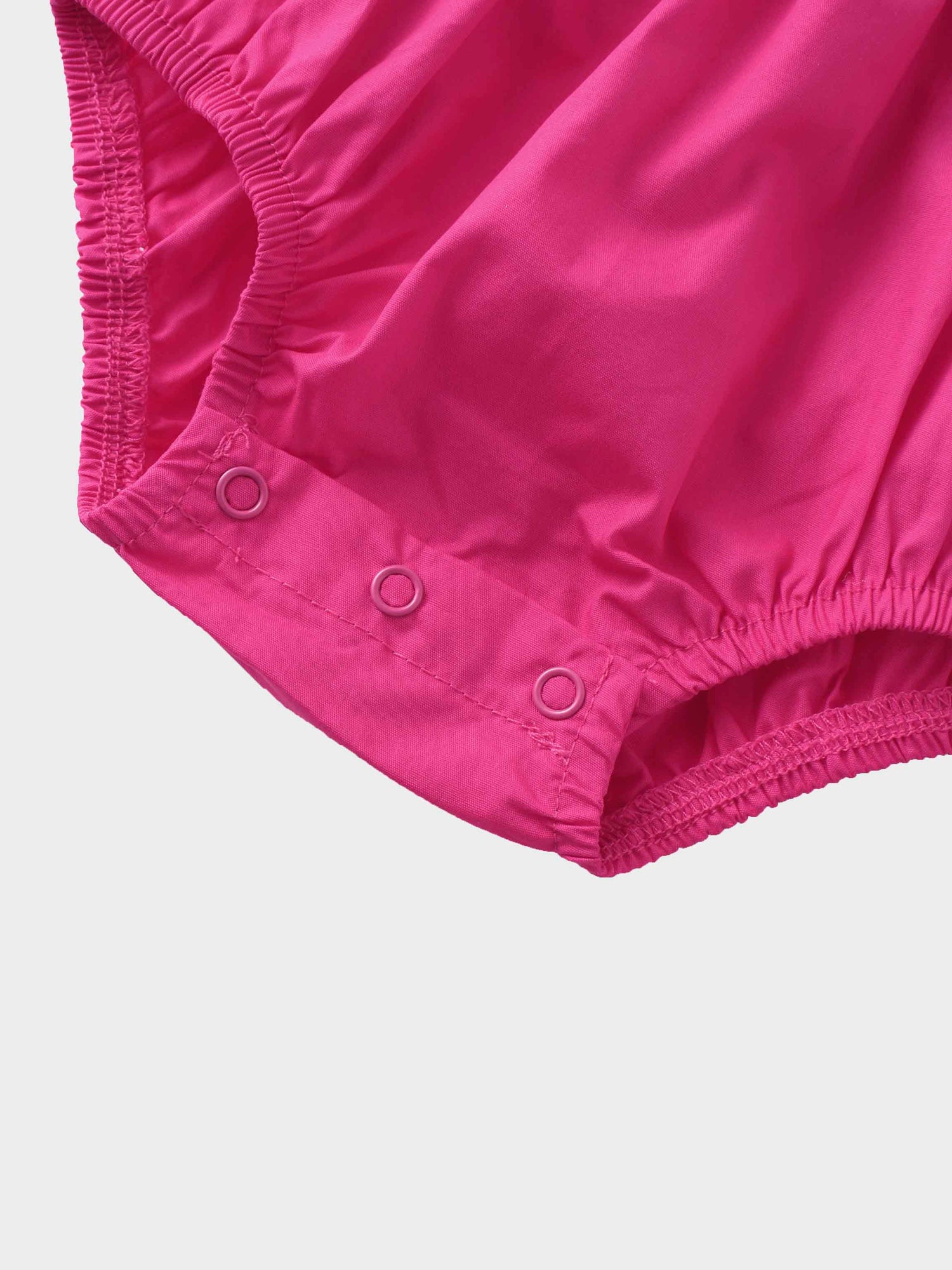 Baby girl pink romper diaper detail
