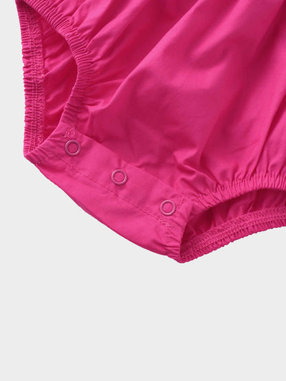 Baby girl pink romper diaper detail