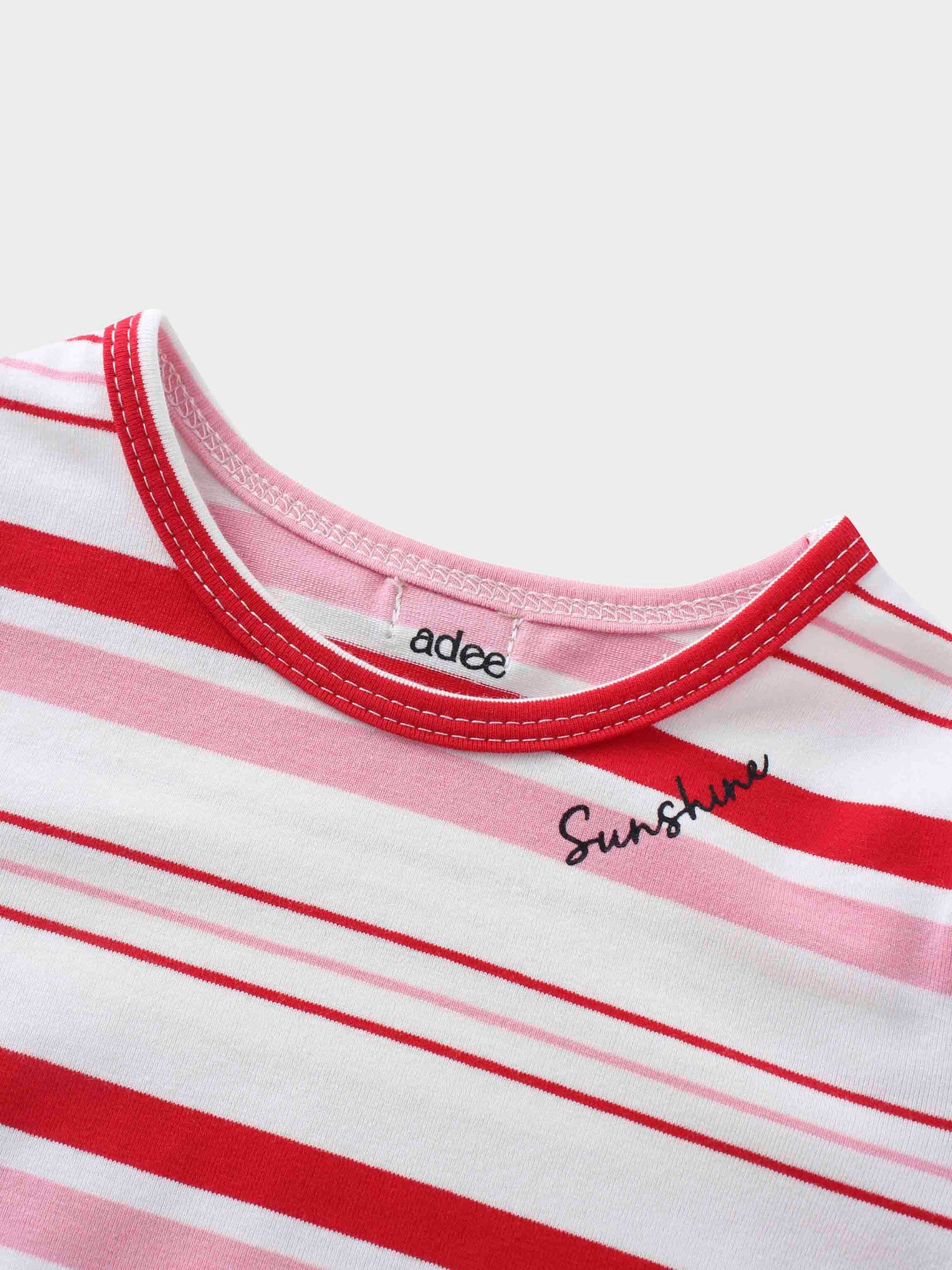 Pink and red striped girls shirts