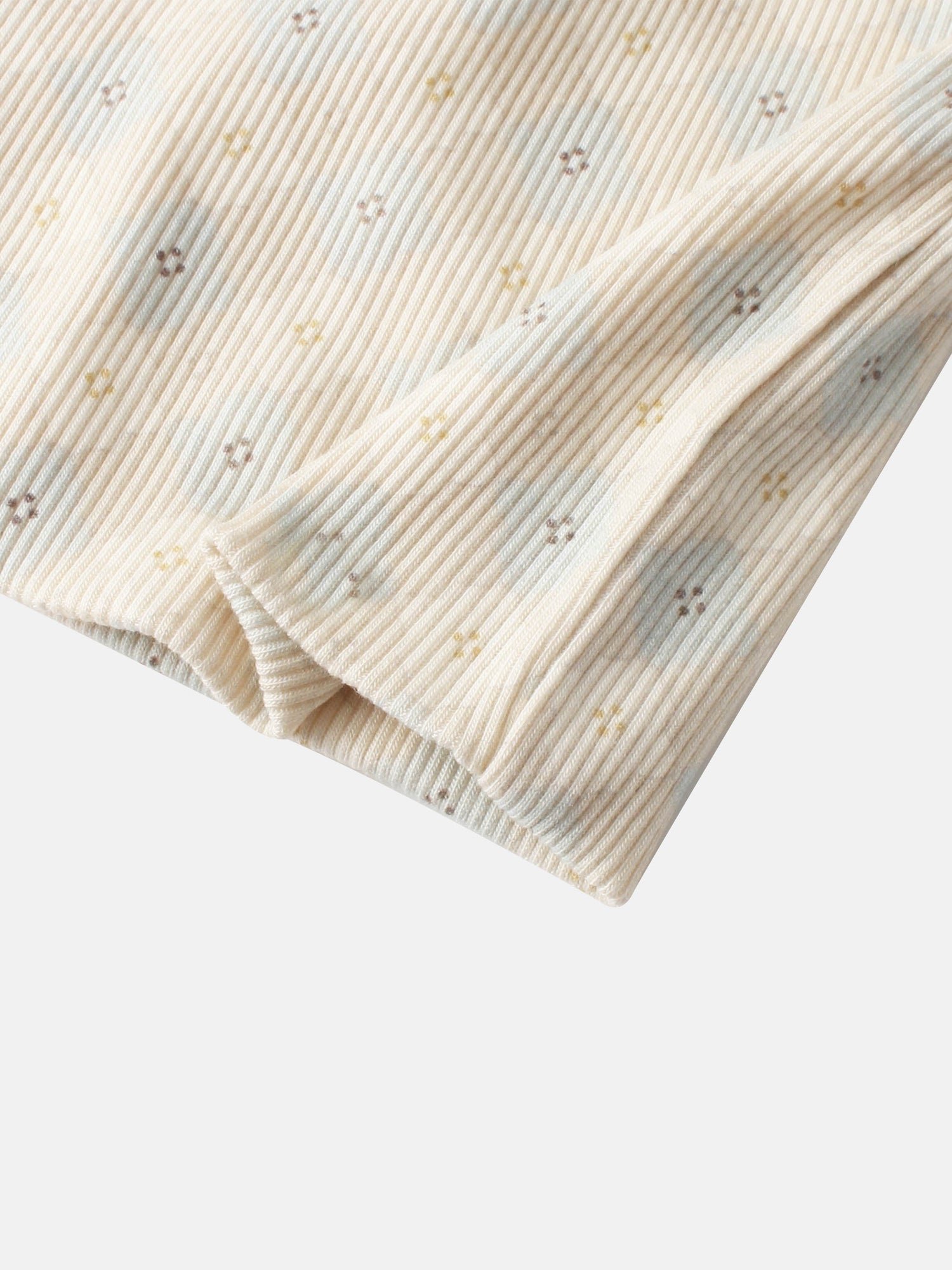 Little Button Blue Layette Set for boys; cream ribbed knit fabric with tiny pastel cross-stitch accents