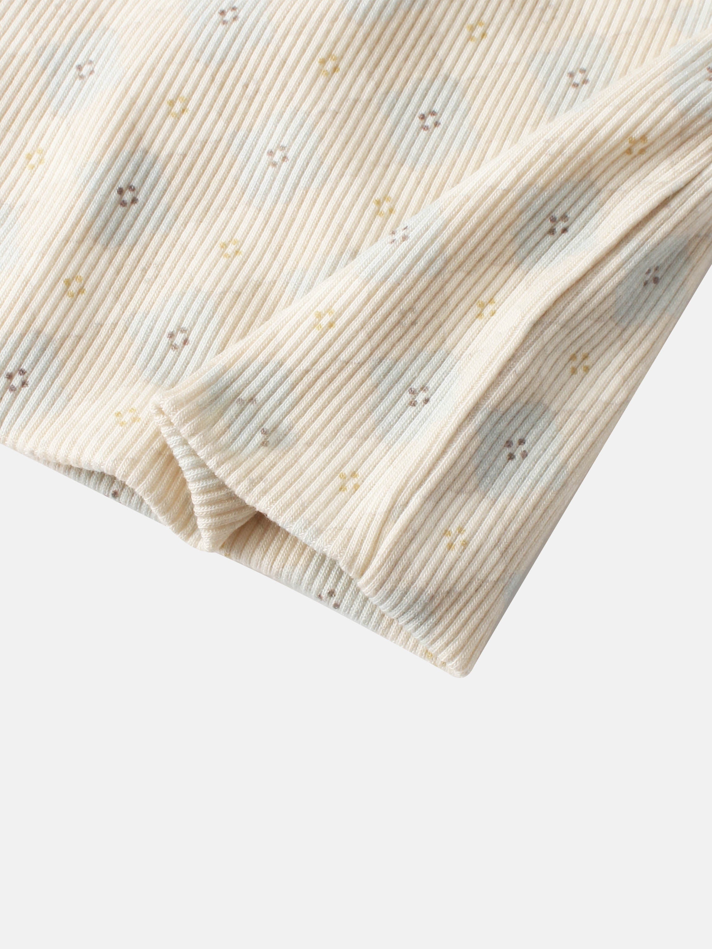 Little Button Blue Layette Set for boys; cream ribbed knit fabric with tiny pastel cross-stitch accents