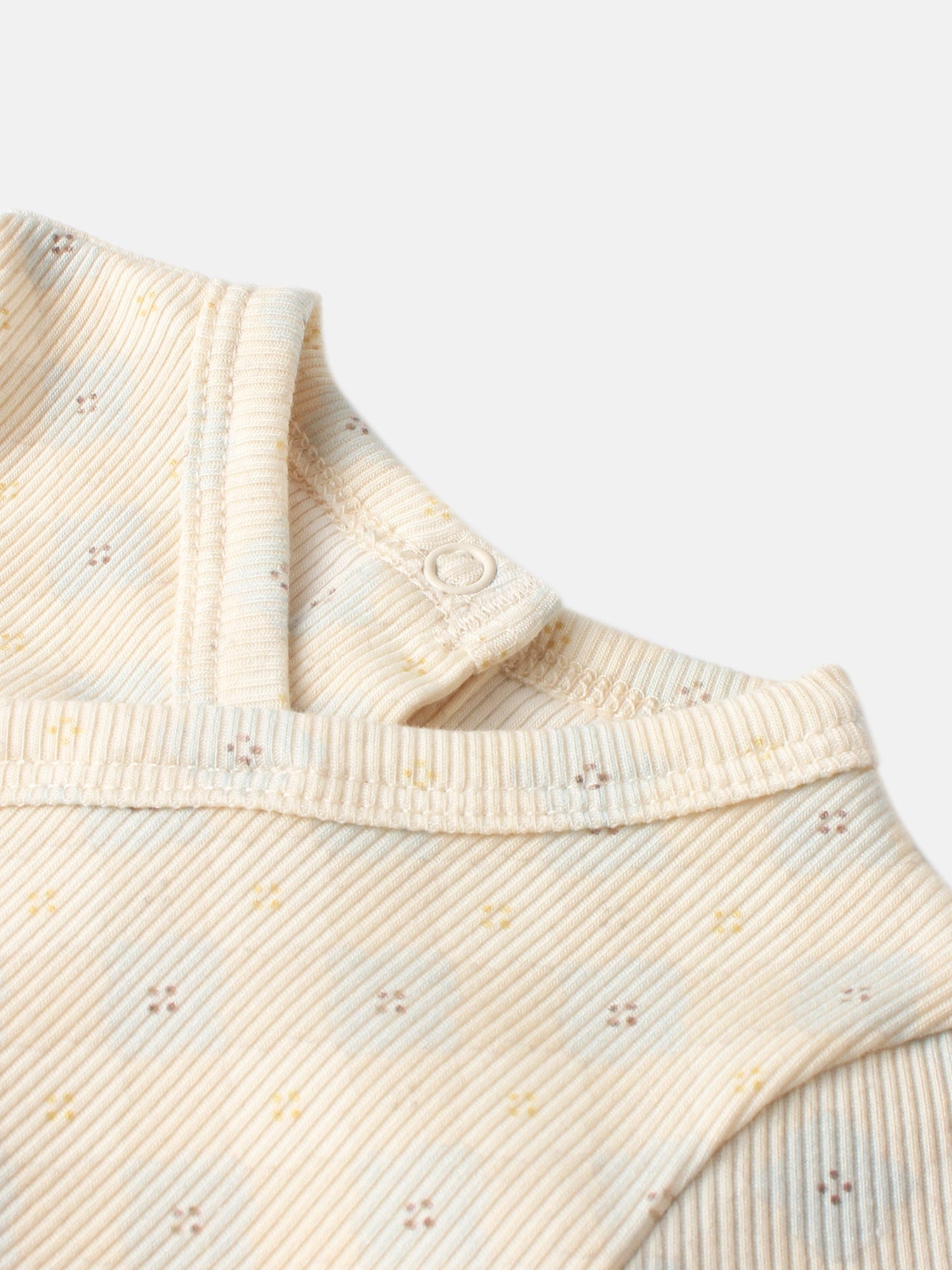Adee Little Button Blue layette set; cream ribbed knit with tiny multicolor specks and button detail.