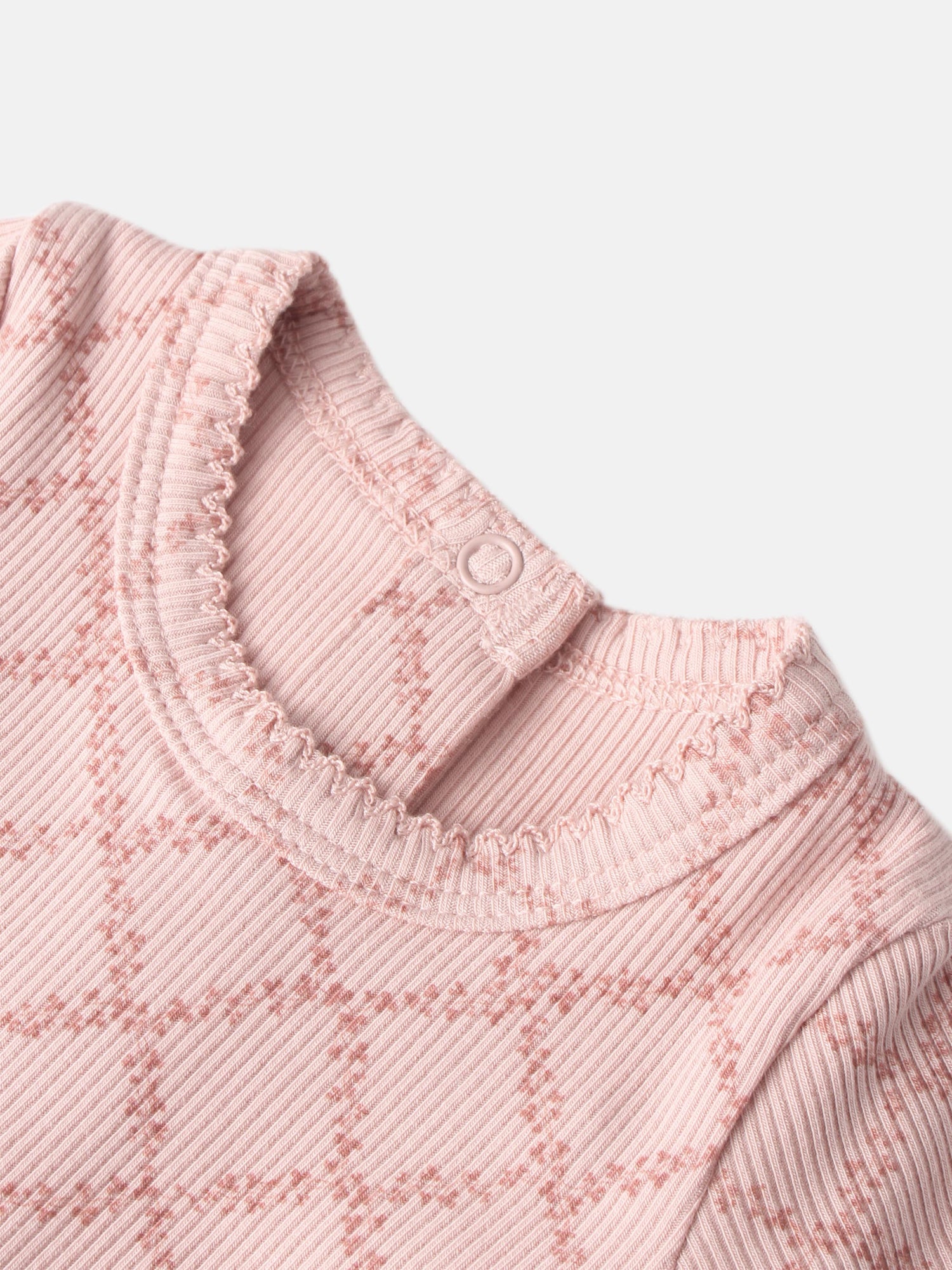 Pink Leaf Layette Set top with ribbed knit texture, scalloped neck edge and snap button