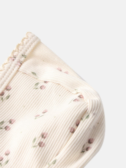 Adee Tiny Tulip layette set top in ivory ribbed fabric with tiny pink floral print.