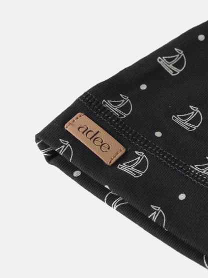 Harbor Dot Layette Set by Adee; black fabric with white anchor and dot pattern, Adee brand tag visible