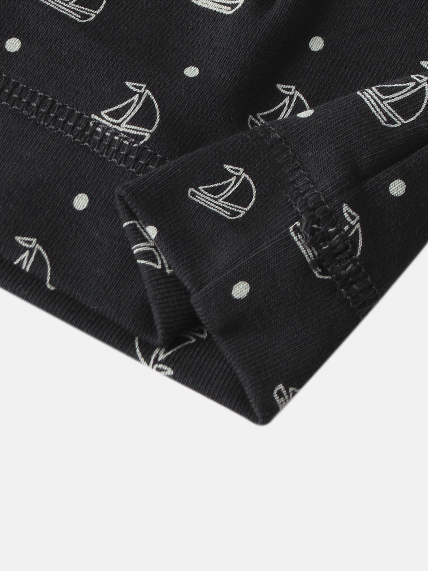 Harbor Dot Layette Set for boys; navy fabric with white anchor motifs and dots