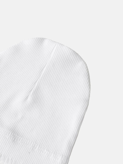Legacy Stitch White layette set close-up of white ribbed cotton fabric; unisex