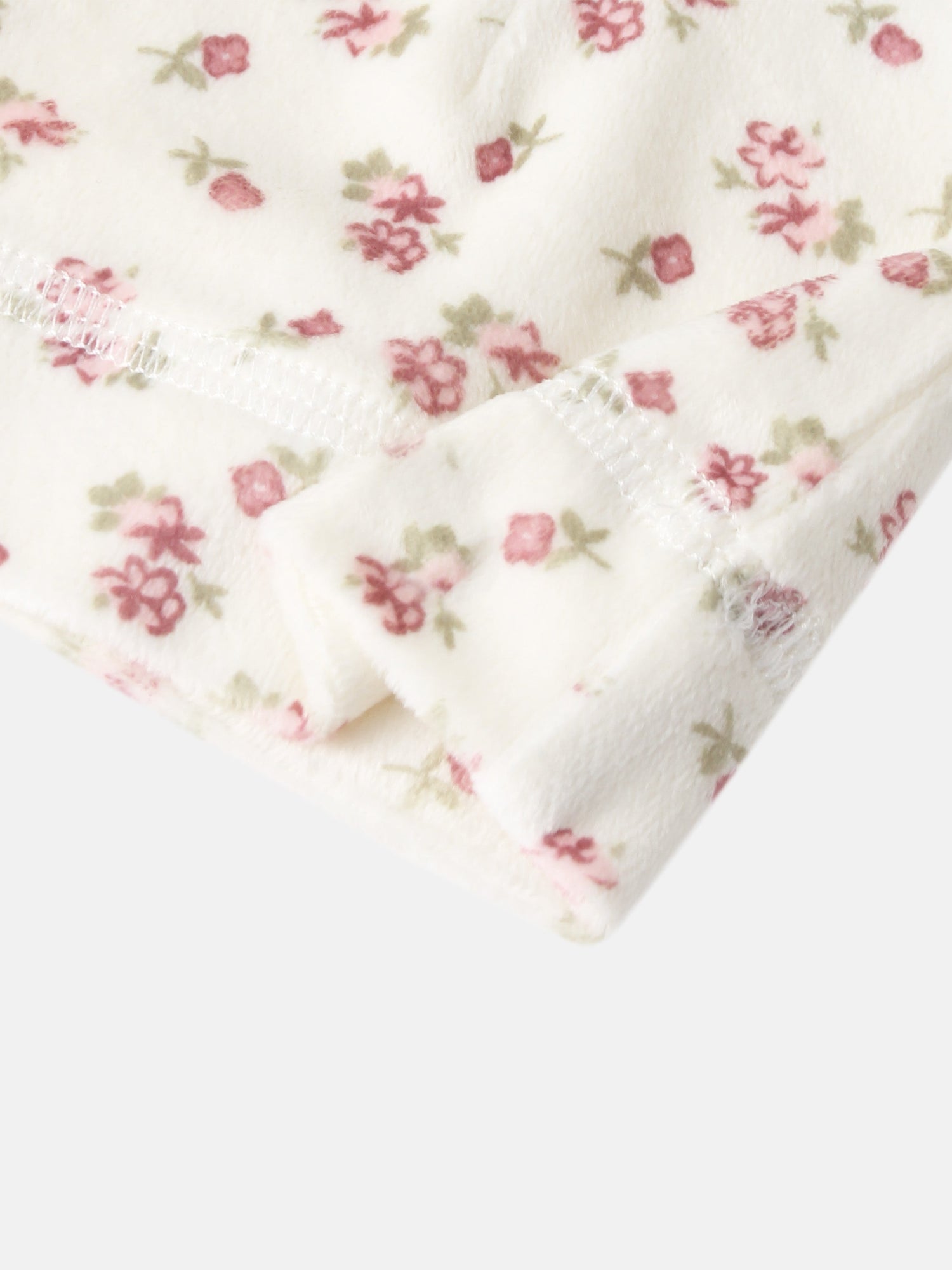 Adee Tiny Blossom layette set, white fleece with pink floral pattern.