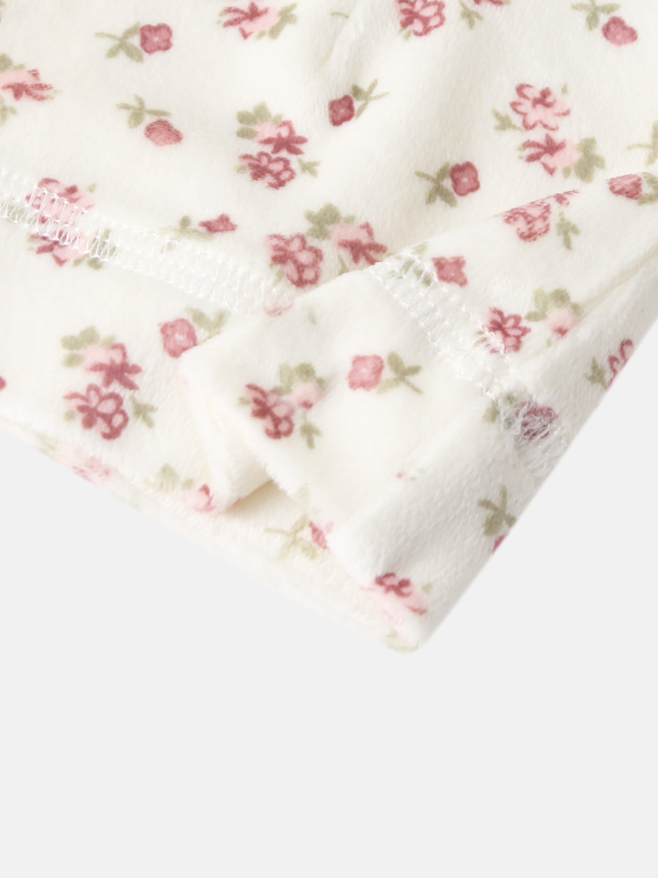 Adee Tiny Blossom layette set, white fleece with pink floral pattern.