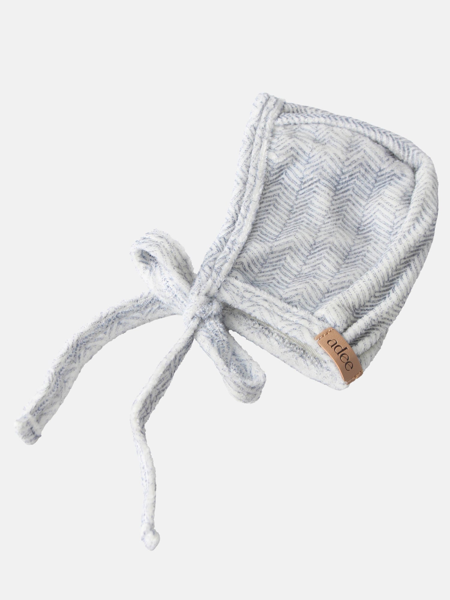 Heritage Herringbone Blue layette hat by Adee with knotted ties and leather tag