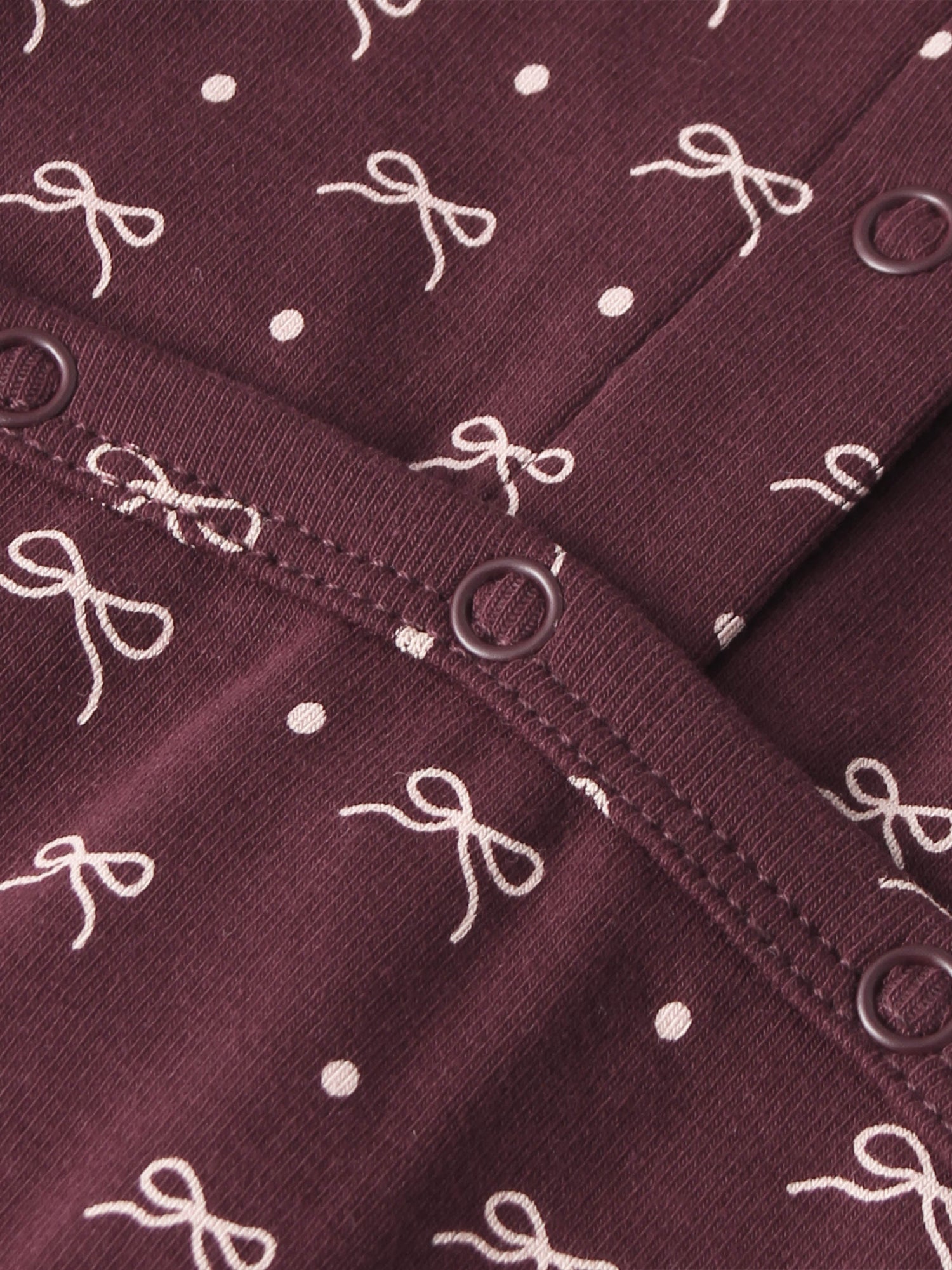 Burgundy Bow Layette Set for girls by Adee; fabric with white bows and dots
