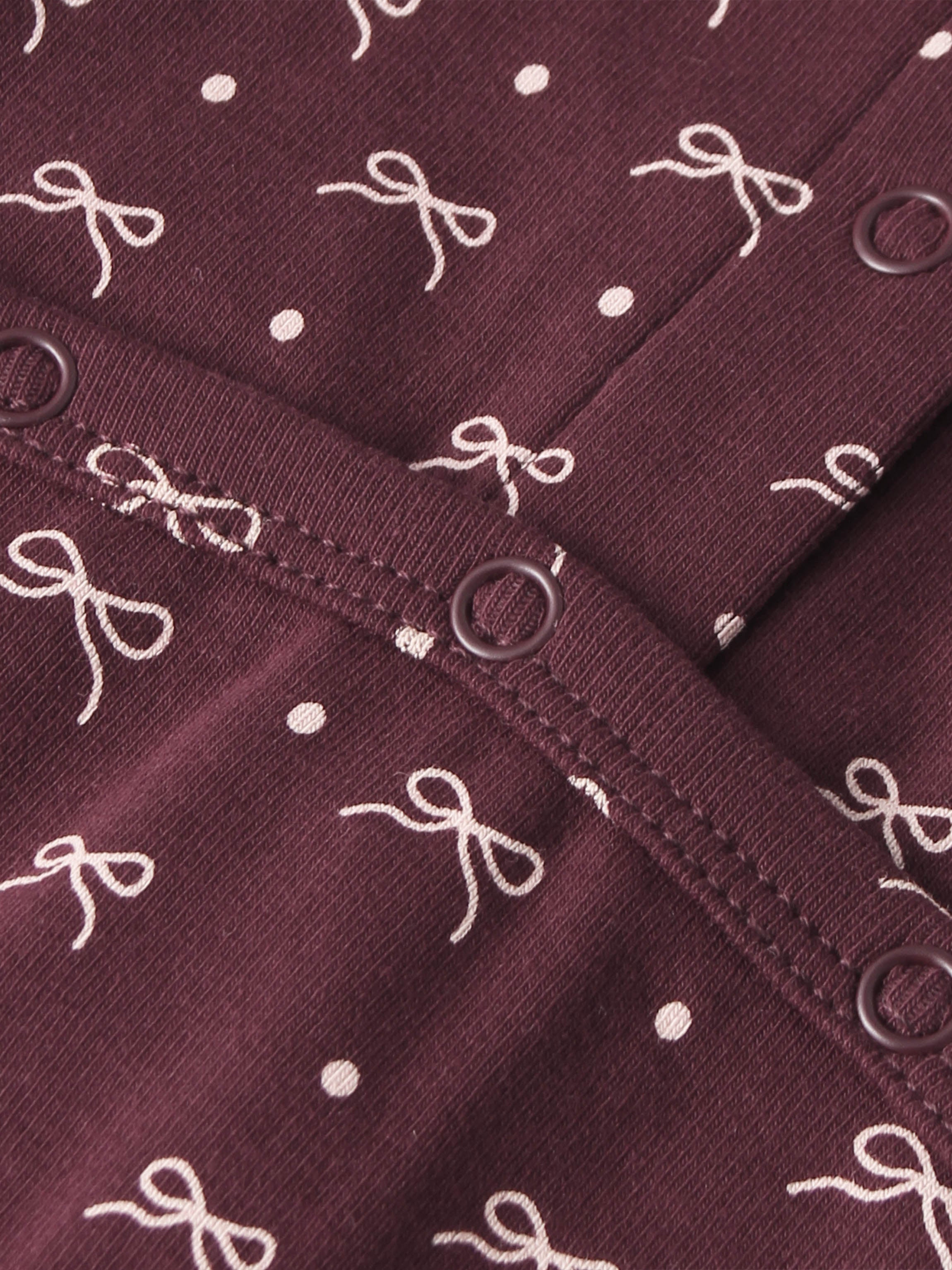 Burgundy Bow Layette Set for girls by Adee; fabric with white bows and dots