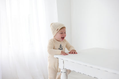 Adee Embroidered Anchor layette set for baby boys in beige knit with anchor embroidery.